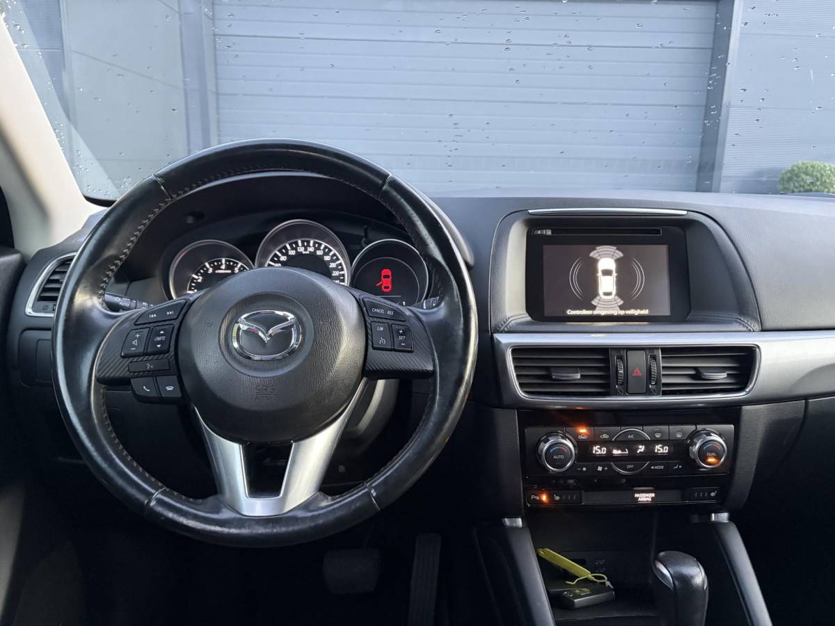 Mazda CX-5 Mazda CX-5 2.0 SkyActiv-G 165 Skylease GT 2WD ✓Recent beurt gehad✓Automaat✓2e Eigenaar✓Camera✓Trekhaak✓Navi✓Leder✓Keyless✓Pdc V+A✓Winterset✓165pk✓Stoelverw✓Elekt Memory Stoelen✓Rijstrooksensor✓Dodehoeksensor✓N.A.P✓Bj 12-2015✓Apk tot 07-2027