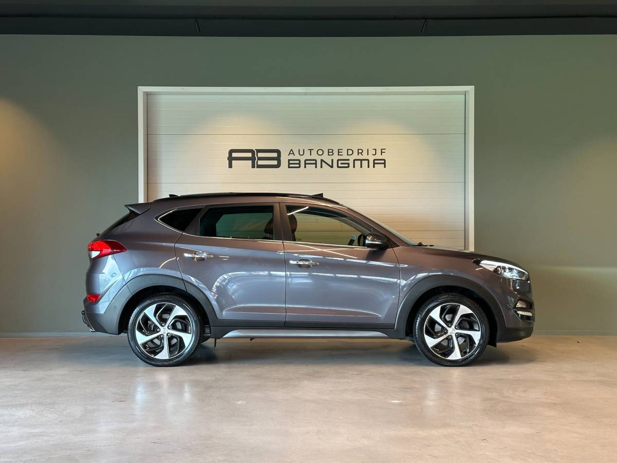 Hyundai Tucson Hyundai Tucson 1.6 T-GDi 4WD AUTOMAAT PREMIUM|CLIMA AIRCO|PANORAMADAK|CRUISECONTROL|LEDEREN BEKLEDING|TREKHAAK|XENON|NAVIGATIE|NAP