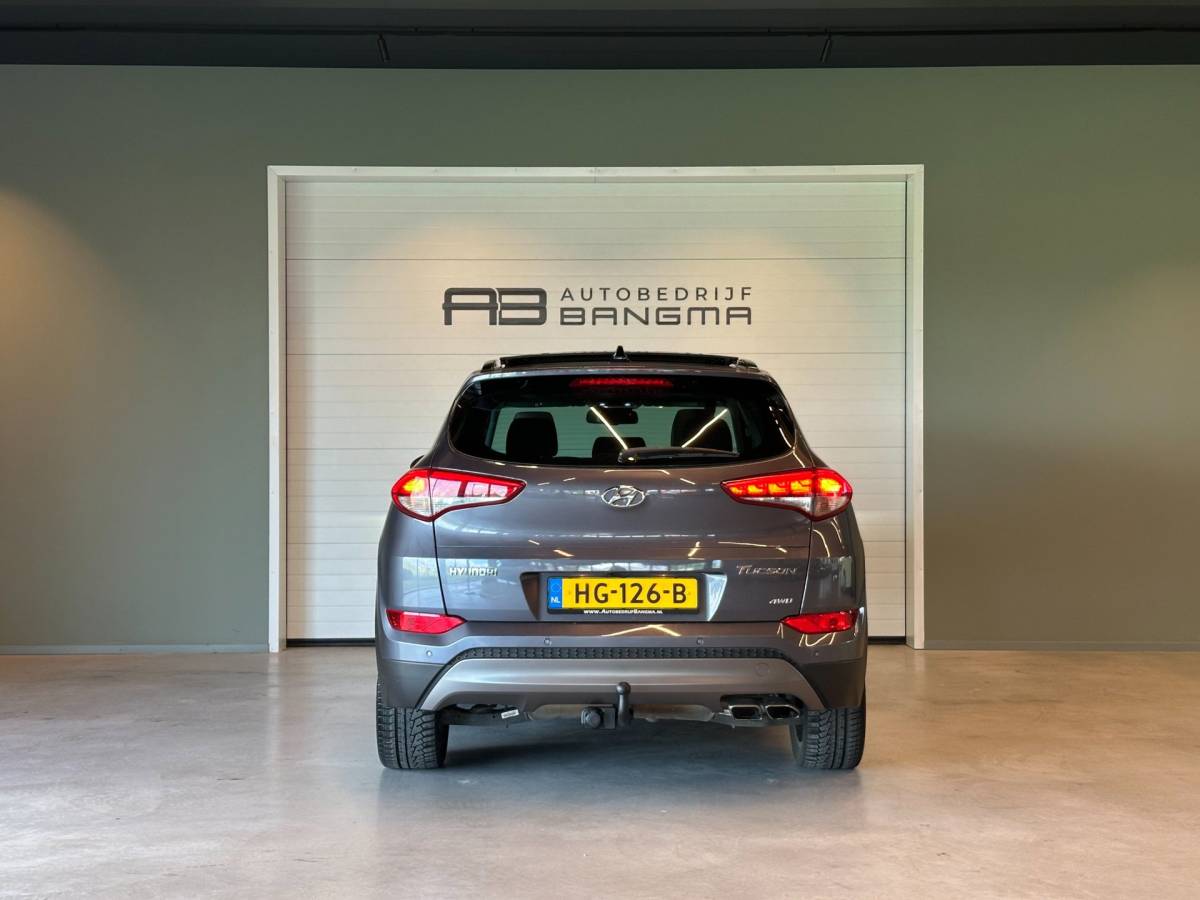 Hyundai Tucson Hyundai Tucson 1.6 T-GDi 4WD AUTOMAAT PREMIUM|CLIMA AIRCO|PANORAMADAK|CRUISECONTROL|LEDEREN BEKLEDING|TREKHAAK|XENON|NAVIGATIE|NAP