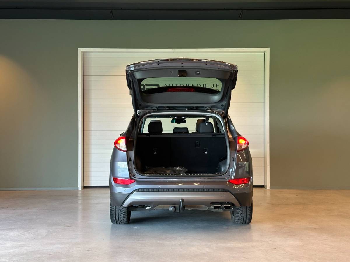 Hyundai Tucson Hyundai Tucson 1.6 T-GDi 4WD AUTOMAAT PREMIUM|CLIMA AIRCO|PANORAMADAK|CRUISECONTROL|LEDEREN BEKLEDING|TREKHAAK|XENON|NAVIGATIE|NAP