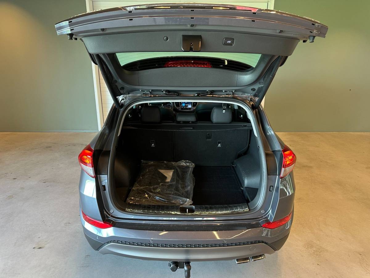 Hyundai Tucson Hyundai Tucson 1.6 T-GDi 4WD AUTOMAAT PREMIUM|CLIMA AIRCO|PANORAMADAK|CRUISECONTROL|LEDEREN BEKLEDING|TREKHAAK|XENON|NAVIGATIE|NAP