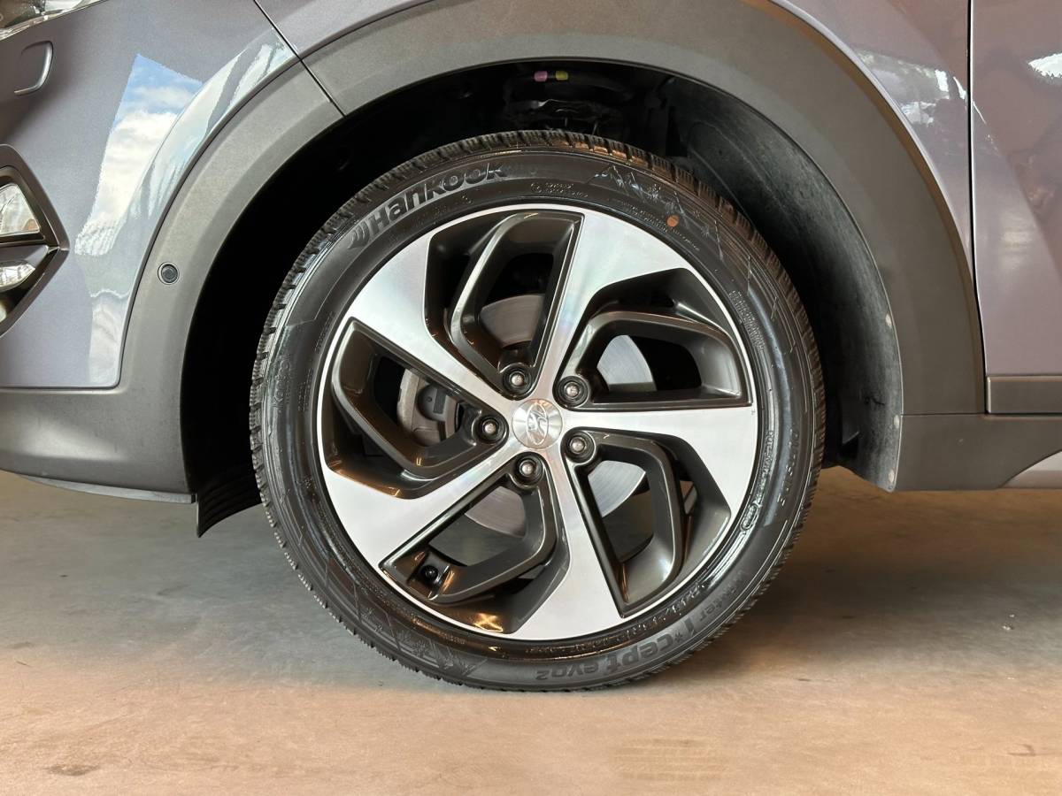 Hyundai Tucson Hyundai Tucson 1.6 T-GDi 4WD AUTOMAAT PREMIUM|CLIMA AIRCO|PANORAMADAK|CRUISECONTROL|LEDEREN BEKLEDING|TREKHAAK|XENON|NAVIGATIE|NAP