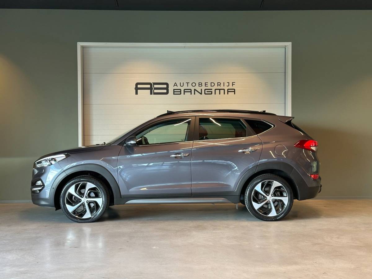Hyundai Tucson Hyundai Tucson 1.6 T-GDi 4WD AUTOMAAT PREMIUM|CLIMA AIRCO|PANORAMADAK|CRUISECONTROL|LEDEREN BEKLEDING|TREKHAAK|XENON|NAVIGATIE|NAP