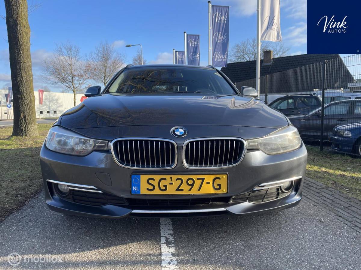 BMW 3 Serie BMW 3-serie Touring 318d | Luxury | NAV | Trekhaak | Cruise Control