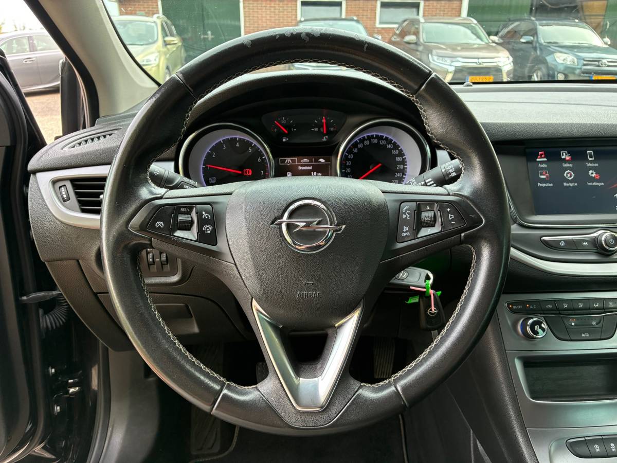 Opel Astra Opel Astra Sports Tourer 1.0 Turbo 120 Jaar Edition | Navi + Clima + Cruise nu €6.975,-!!