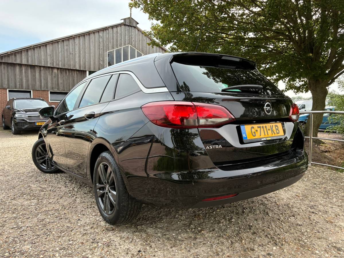 Opel Astra Opel Astra Sports Tourer 1.0 Turbo 120 Jaar Edition | Navi + Clima + Cruise nu €6.975,-!!