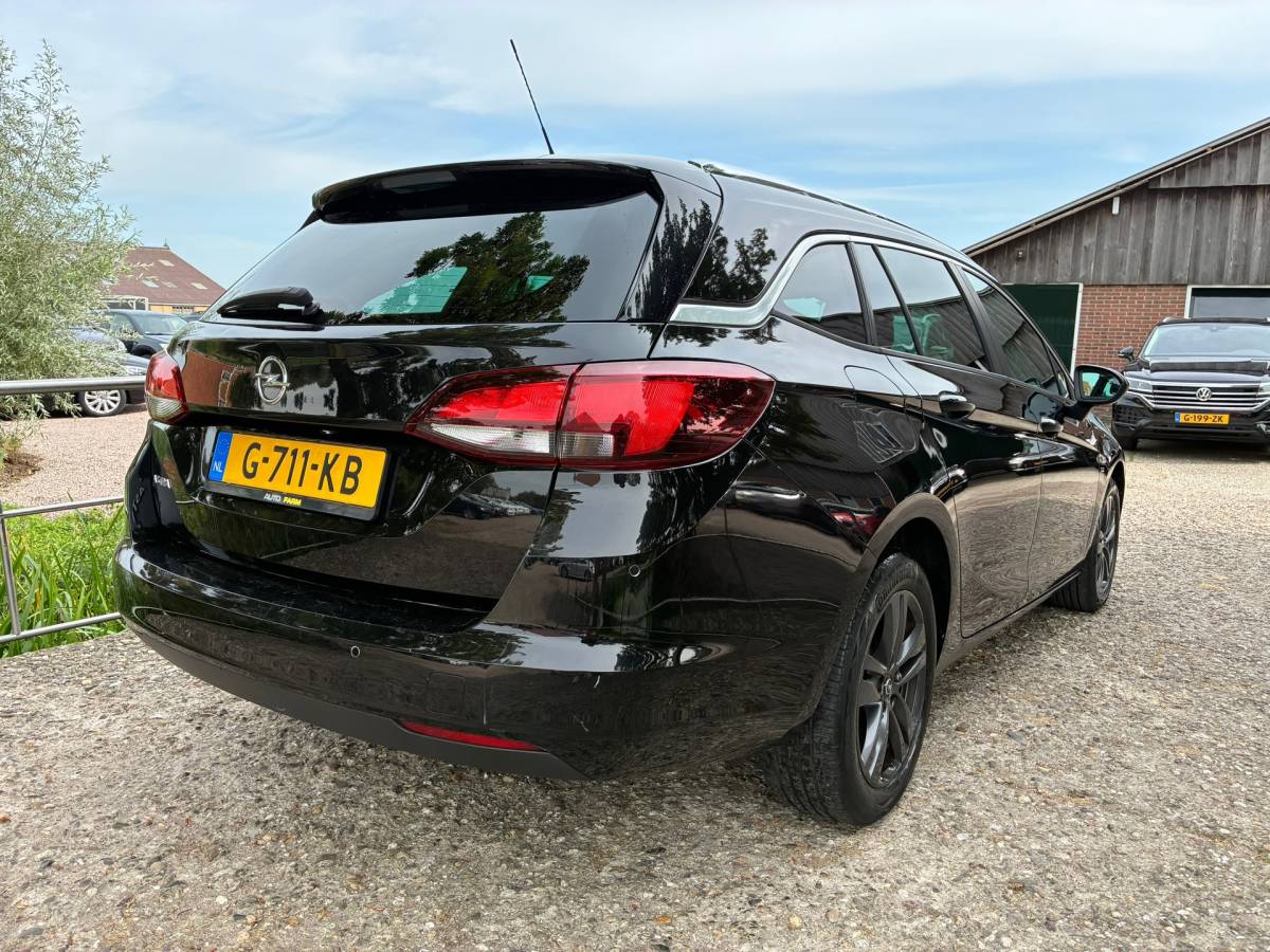 Opel Astra Opel Astra Sports Tourer 1.0 Turbo 120 Jaar Edition | Navi + Clima + Cruise nu €6.975,-!!