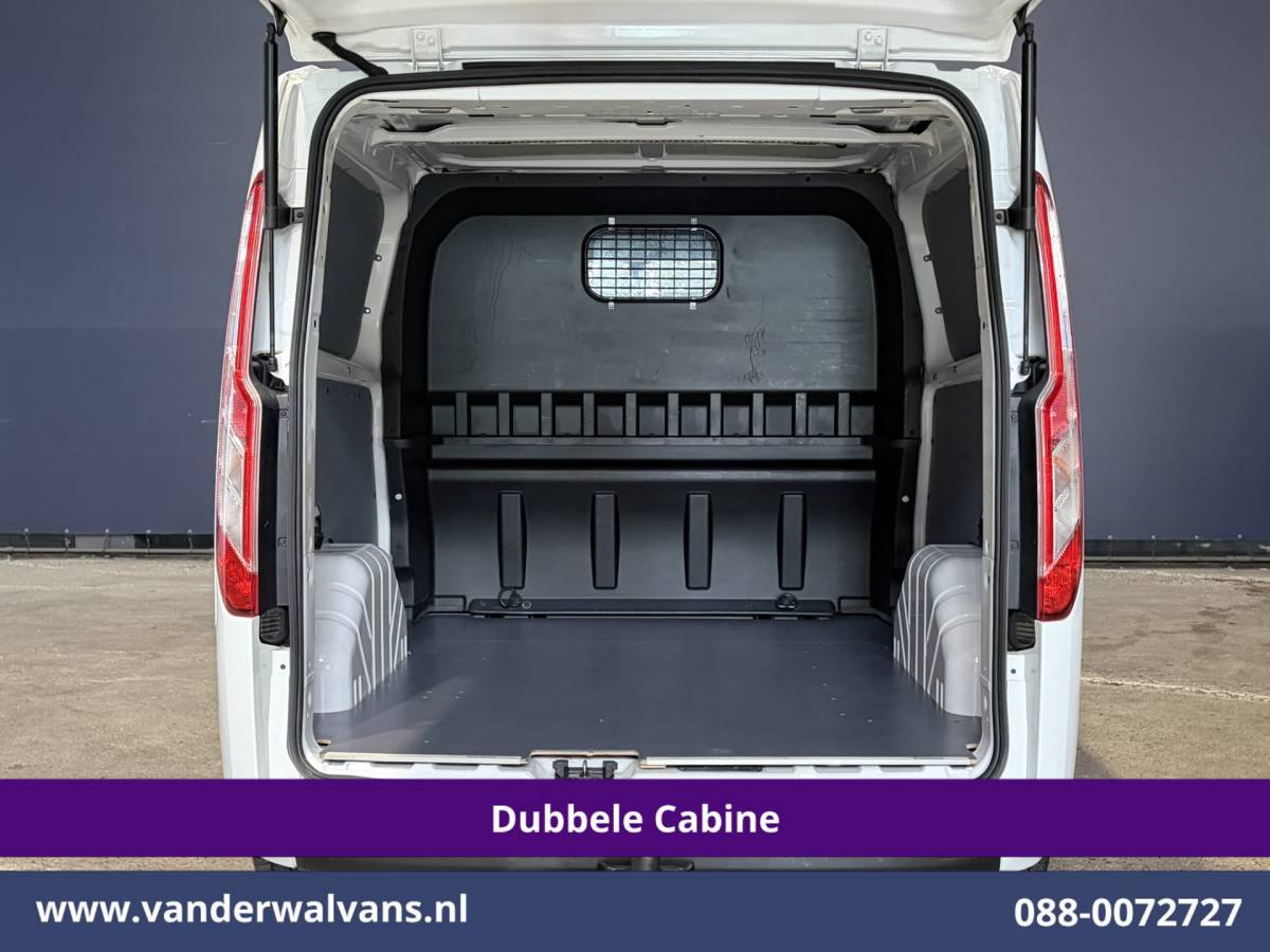 Ford Transit Custom Ford Transit Custom 2.0 TDCI 131pk Automaat L2H1 Dubbele Cabine Euro6 Airco | Xenon | 6-Zits | Camera | Apple Carplay | Adaptieve Cruisecontrol LED, Android Auto, Trekhaak, Stoelverwarming, Verwarmde voorruit, Parkeersensoren, Achterklep