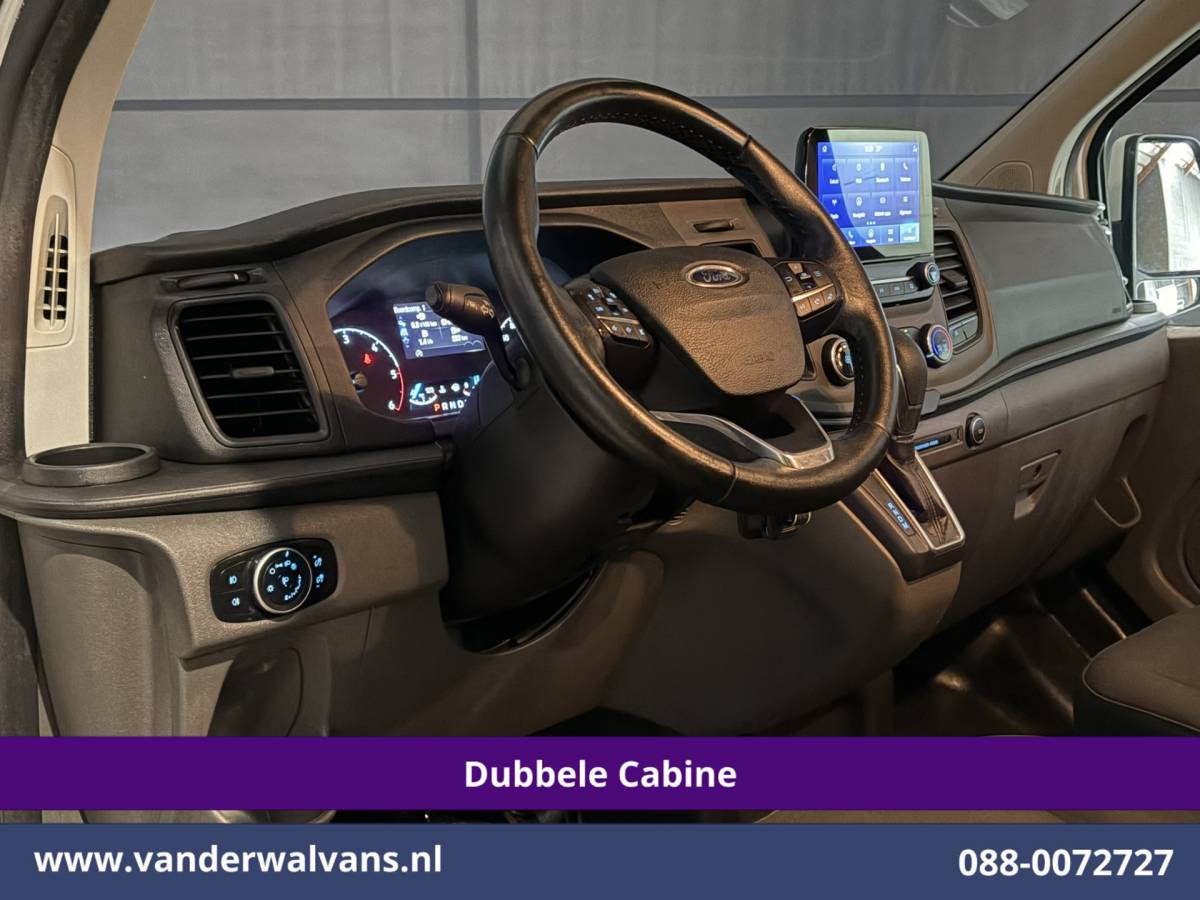 Ford Transit Custom Ford Transit Custom 2.0 TDCI 131pk Automaat L2H1 Dubbele Cabine Euro6 Airco | Xenon | 6-Zits | Camera | Apple Carplay | Adaptieve Cruisecontrol LED, Android Auto, Trekhaak, Stoelverwarming, Verwarmde voorruit, Parkeersensoren, Achterklep