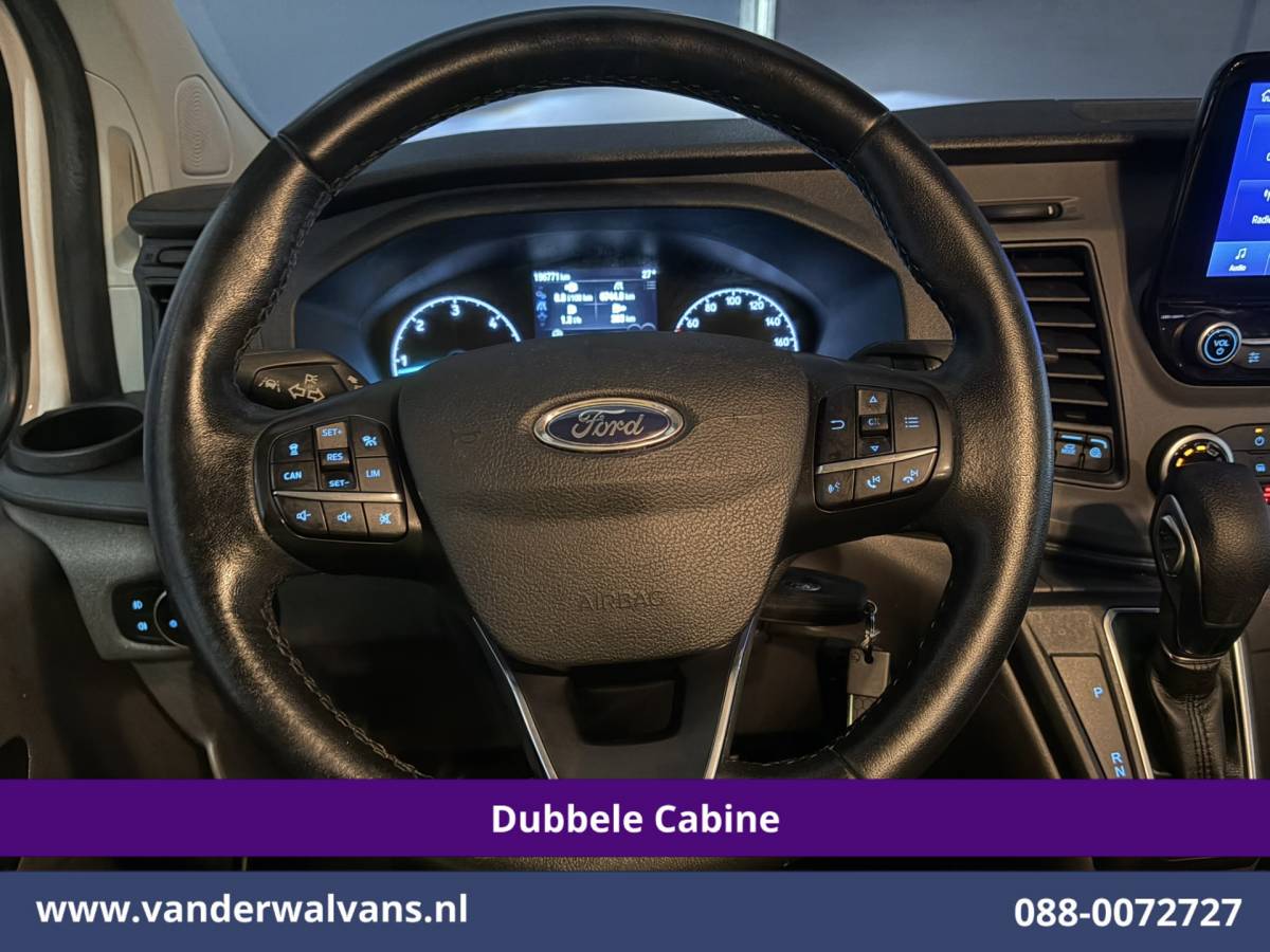 Ford Transit Custom Ford Transit Custom 2.0 TDCI 131pk Automaat L2H1 Dubbele Cabine Euro6 Airco | Xenon | 6-Zits | Camera | Apple Carplay | Adaptieve Cruisecontrol LED, Android Auto, Trekhaak, Stoelverwarming, Verwarmde voorruit, Parkeersensoren, Achterklep