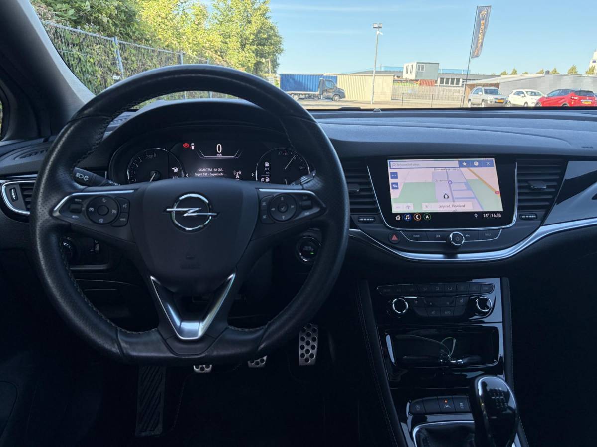 Opel Astra Opel Astra Sports Tourer 1.2 Ultimate ✓146pk✓2e Eigenaar✓Trekhaak✓Camera✓Carplay✓Navi✓Alcantara-Leder✓17”Lmv✓Stoelverw-Stuurverw✓Net beurt gehad✓Dodehoek✓Rijstrooksensor✓Pdc V+A✓6 Bak✓N.A.P✓Bj 11-2020✓Apk tot 08-2028
