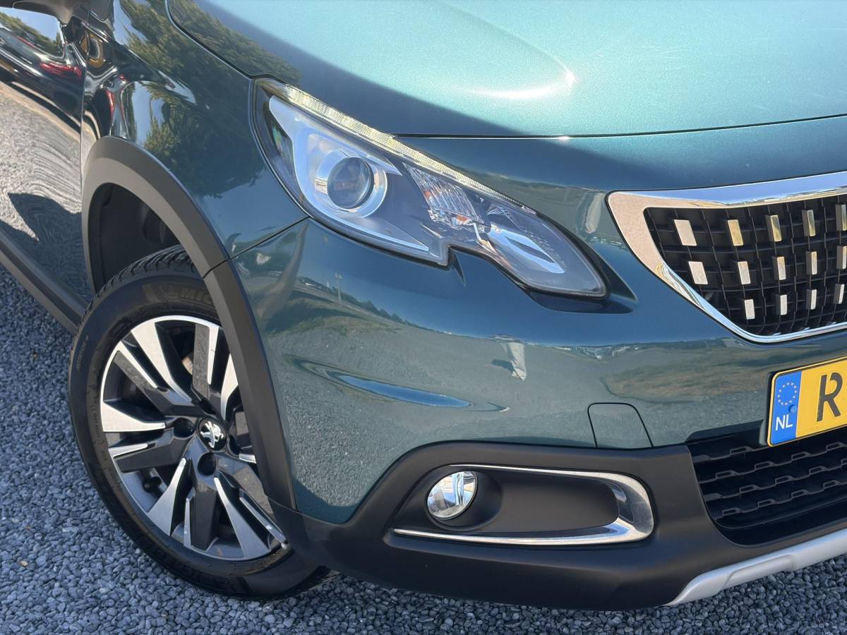 Peugeot 2008 Peugeot 2008 1.2 PureTech Allure D-riem vv in 02-2026 l Pano l Carplay l Camera l Halfleder l 110pk l Dealer Onderhouden l 2e Eigenaar l Navi l Clima l Cruise l Pdc l Lm velgen l Apk tot 02-2027