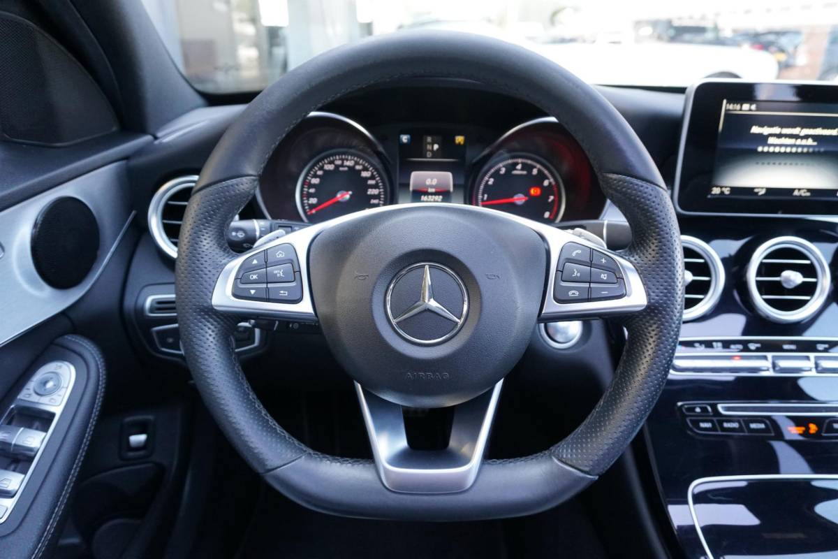 Mercedes-Benz C-Klasse Mercedes-Benz C-klasse Estate 180 Business Solution AMG + CAMERA / PANO / DODEHOEK / NAVI / LEDER