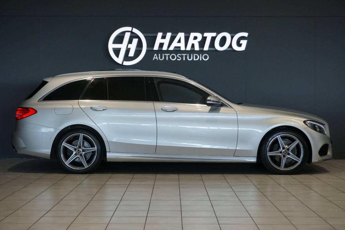 Mercedes-Benz C-Klasse Mercedes-Benz C-klasse Estate 180 Business Solution AMG + CAMERA / PANO / DODEHOEK / NAVI / LEDER