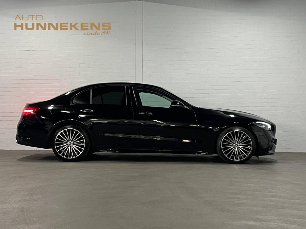 Mercedes-Benz C-Klasse Mercedes-Benz C-klasse 180 AMG Line Ambiente verlichting | Cruise control | Stoelverwarming | Achteruitrij camera | AMG wielen | Carplay | Dodehoek | Navigatie