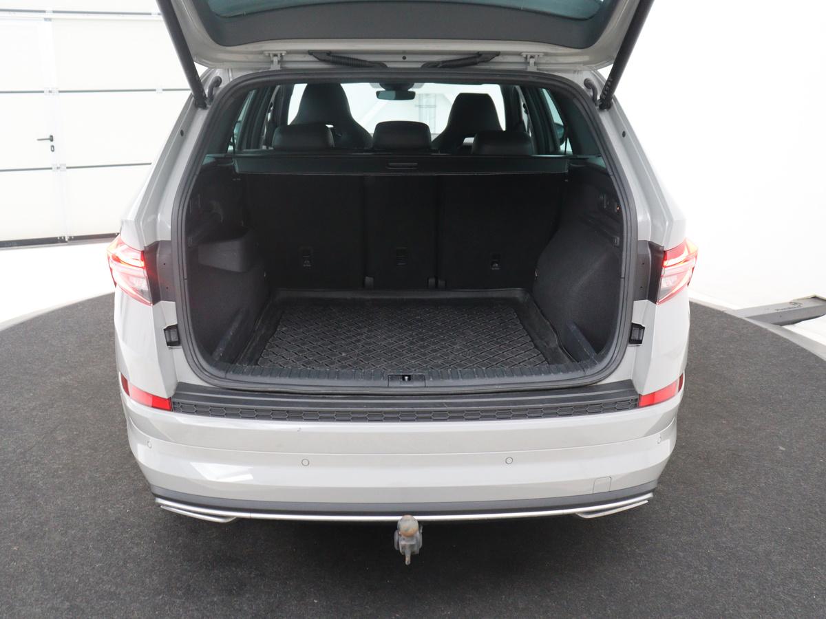 Škoda Kodiaq Skoda Kodiaq 1.5 TSI Sportline Business | Leder | Memory | Adaptive cruise |  Stoelverwarming | Camera | Park assist | Sfeerverlichting | Bluetooth | Navigatie | Elektrische achterklep | Trekhaak