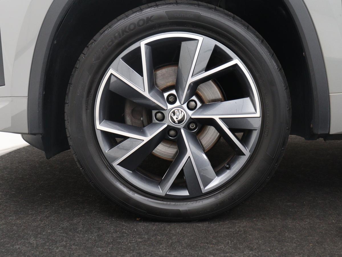 Škoda Kodiaq Skoda Kodiaq 1.5 TSI Sportline Business | Leder | Memory | Adaptive cruise |  Stoelverwarming | Camera | Park assist | Sfeerverlichting | Bluetooth | Navigatie | Elektrische achterklep | Trekhaak