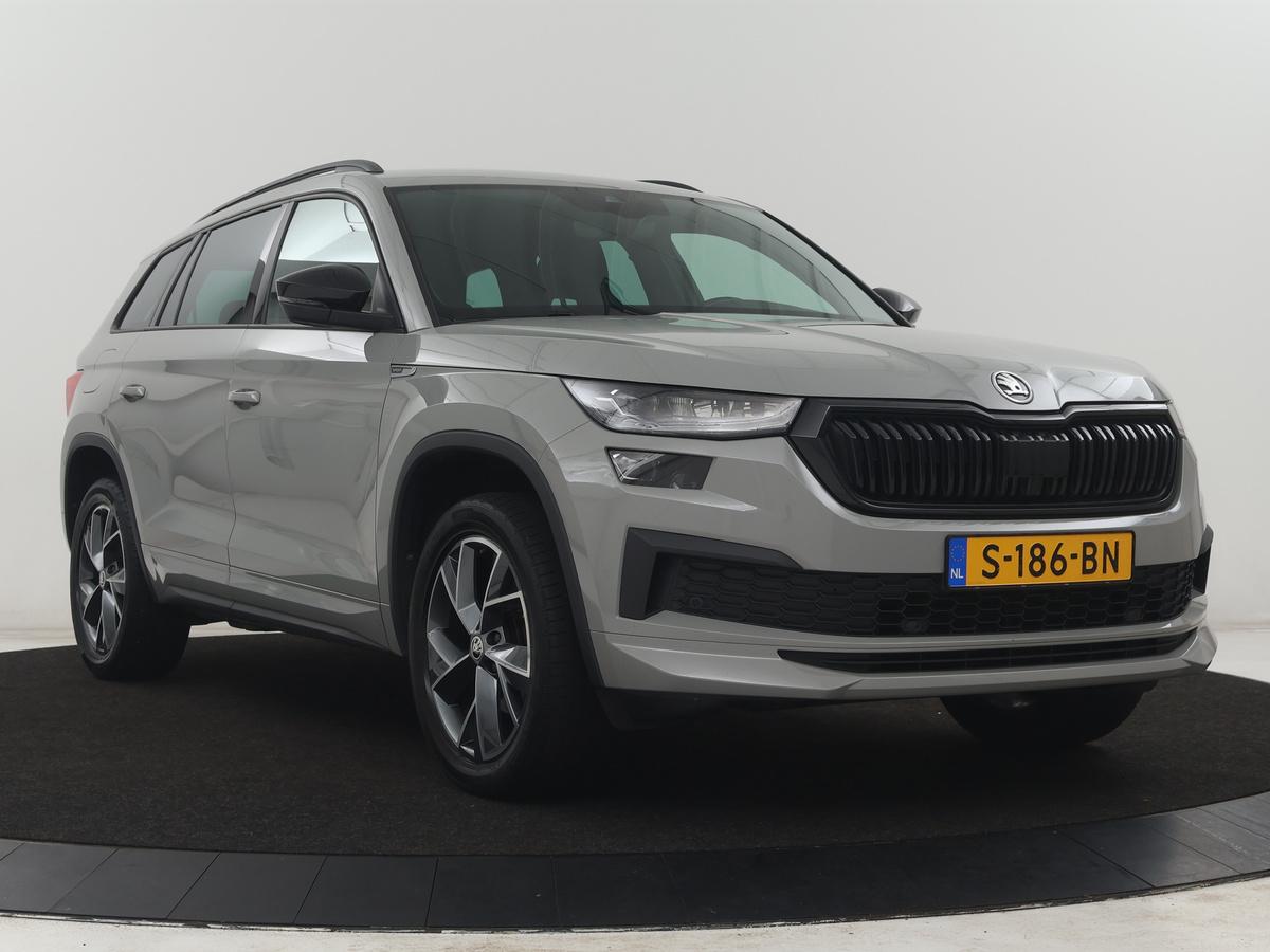 Škoda Kodiaq Skoda Kodiaq 1.5 TSI Sportline Business | Leder | Memory | Adaptive cruise |  Stoelverwarming | Camera | Park assist | Sfeerverlichting | Bluetooth | Navigatie | Elektrische achterklep | Trekhaak