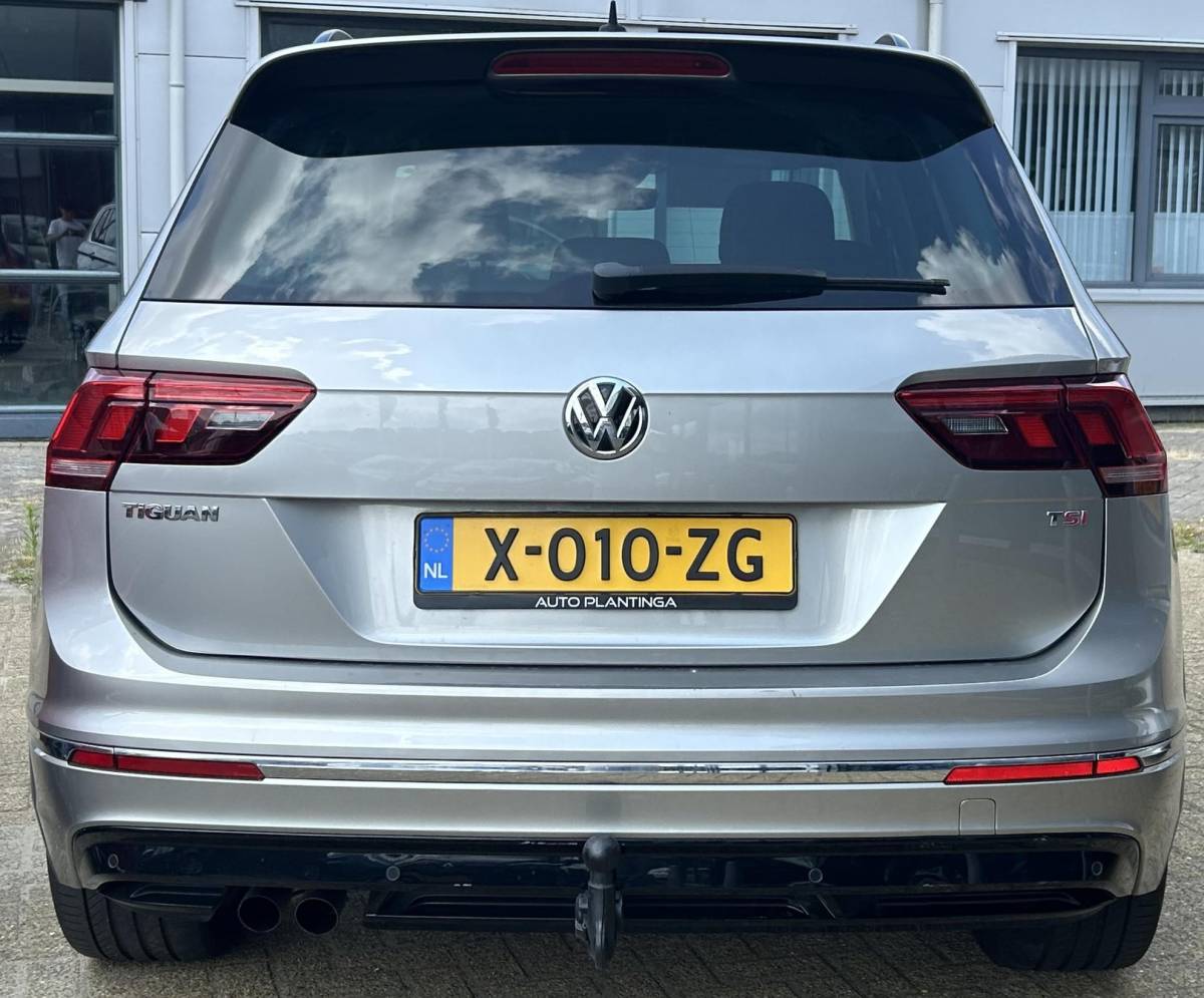Volkswagen Tiguan Volkswagen Tiguan 1.4 TSI ACT R-Line Business R 150PK | AUTOMAAT | Elektrische Trekhaak | Adaptive Cruise Control | Navigatie | Parkeersensoren | 19 inch | Stoelverwarming | Climate Control | APK tot 14-03-2027 | 2 Sleutels |