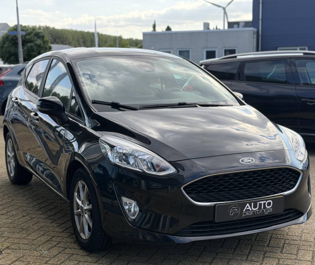 Ford Fiesta Ford Fiesta 1.0 EcoBoost Titanium 101PK | AUTOMAAT | Volledige Onderhoudshistorie | Carplay | Airco | Cruise Control | Lichtmetalen Velgen | Privacy Glass |
