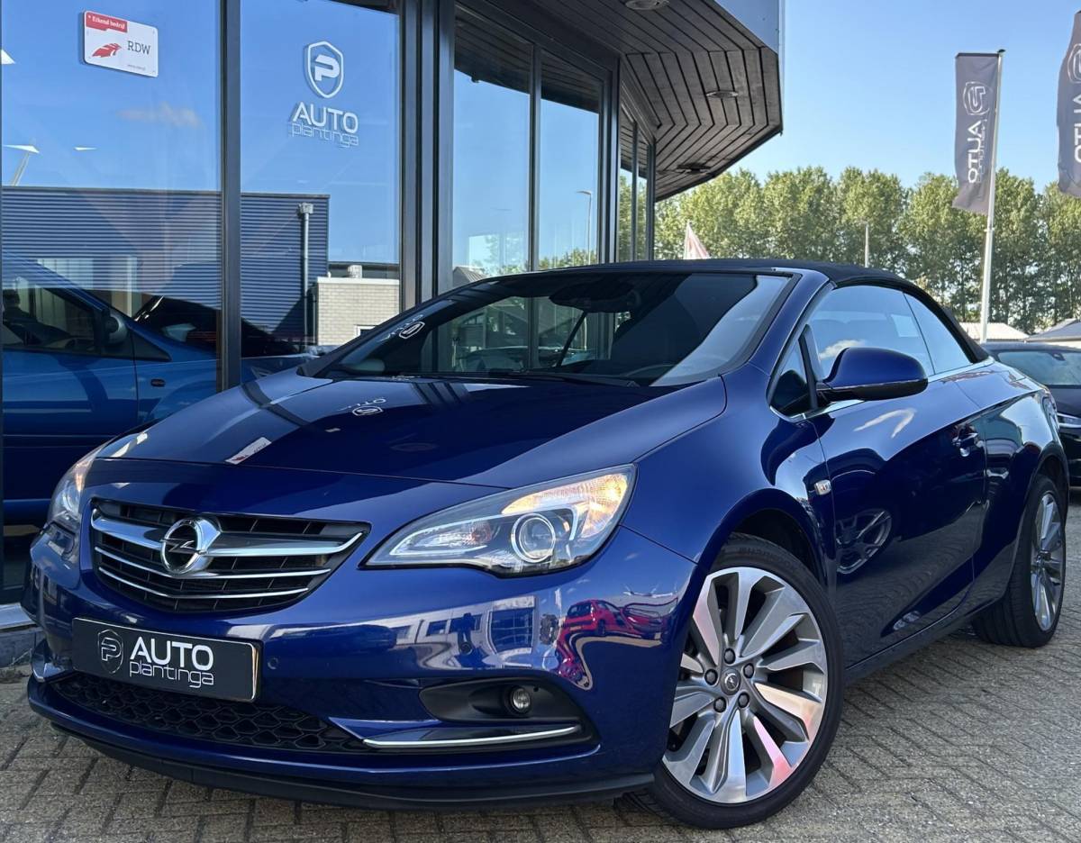 Opel Cascada Opel Cascada 1.4 Turbo ecoFLEX Cosmo 140PK | Zeer Nette Staat! | NL AUTO | CABRIO | Onderhoudshistorie | Luxe Stoelen | Achteruitrijcamera | Stoelverwarming | 19 Inch | Lederen Bekleding | Parkeersensoren Voor en Achter | Bi-Xenon | Navigatie | Climate Control | 2 Sleutels |