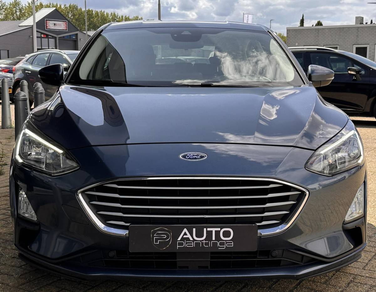 Ford Focus Ford Focus 1.0 EcoBoost Trend Edition Business 125PK | NL AUTO | NAP | Onderhoudshistorie | Parkeersensoren Voor en Achter | Airco | Navigatie | Cruise Control | Lichtmetalen Velgen | 2 Sleutels |