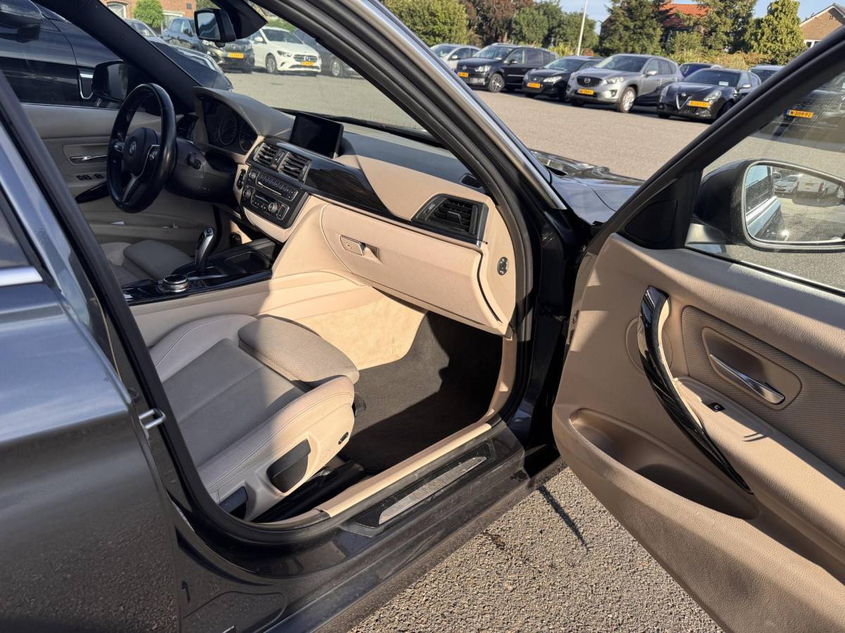 BMW 3 Serie BMW 3-serie 320i Executive Sport / Nap / Garantie / Airco / Navi / Cruise / Carplay /