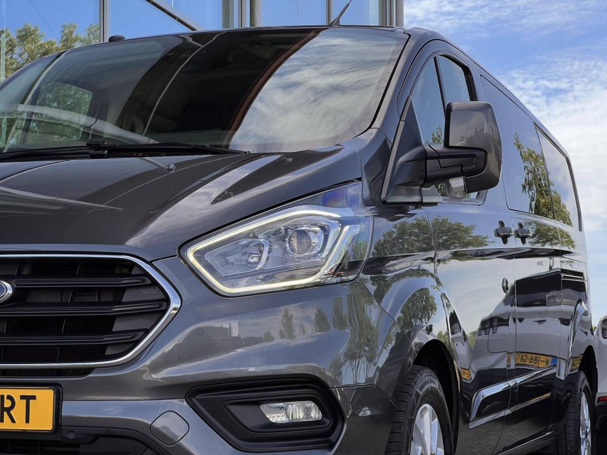 Ford Transit Custom Ford Transit Custom 320 2.0 TDCI L2H1 Limited DC | 125.000 KM | Betimmerde Laadruimte | Navigatie | Adaptieve Cruise Control | Stoelverwarming |