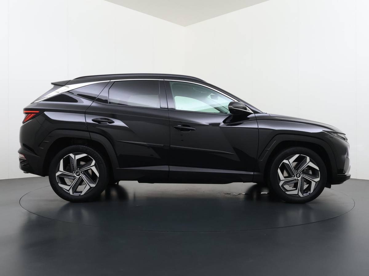 Hyundai Tucson Hyundai Tucson 1.6 T-GDI HEV Premium 360 Camera | Leder Interieur met Elektrische Stoelverstelling | Navigatie