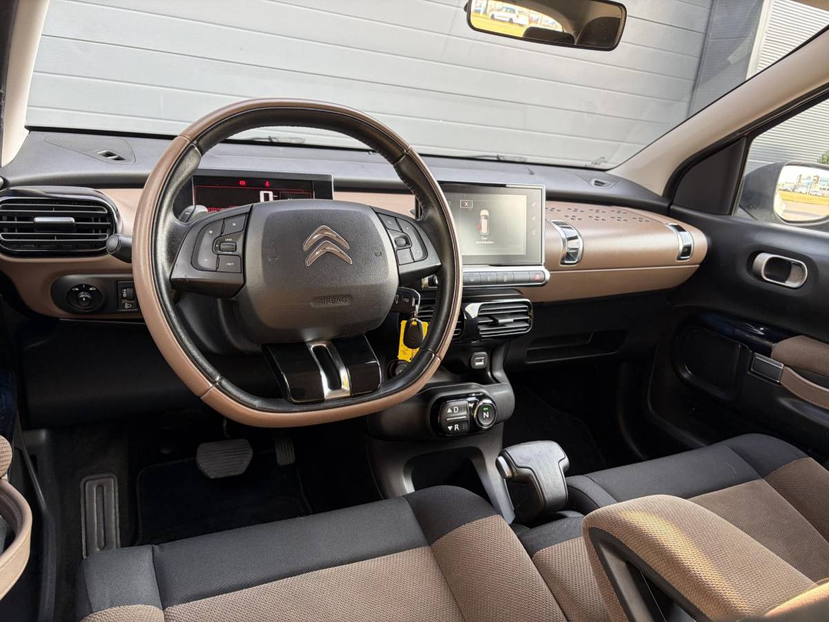 Citroën C4 Cactus Citroen C4 Cactus 1.2 PureTech Feel ✓D-riem vv in 06-2025✓Navi✓Carplay✓Clima✓Cruise✓Pdc✓Automaat✓N.A.P✓Apk tot 06-2027