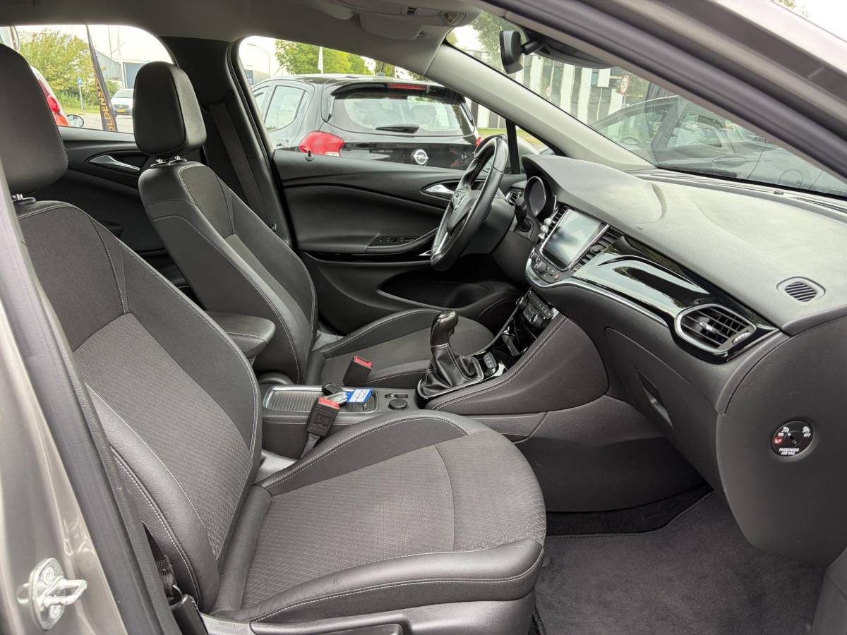 Opel Astra Opel Astra 1.4 Innovation ✓2e Eigenaar✓Carplay✓Navi✓150pk✓Keyless✓6 Bak✓Halfleder✓Rijstrooksensor✓Pdc V+A✓Clima✓Cruise✓Lm velgen✓Bj 12-2016✓N.A.P✓Apk tot 09-2027