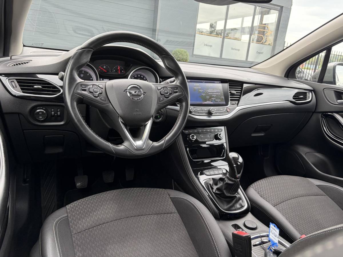 Opel Astra Opel Astra 1.4 Innovation ✓2e Eigenaar✓Carplay✓Navi✓150pk✓Keyless✓6 Bak✓Halfleder✓Rijstrooksensor✓Pdc V+A✓Clima✓Cruise✓Lm velgen✓Bj 12-2016✓N.A.P✓Apk tot 09-2027