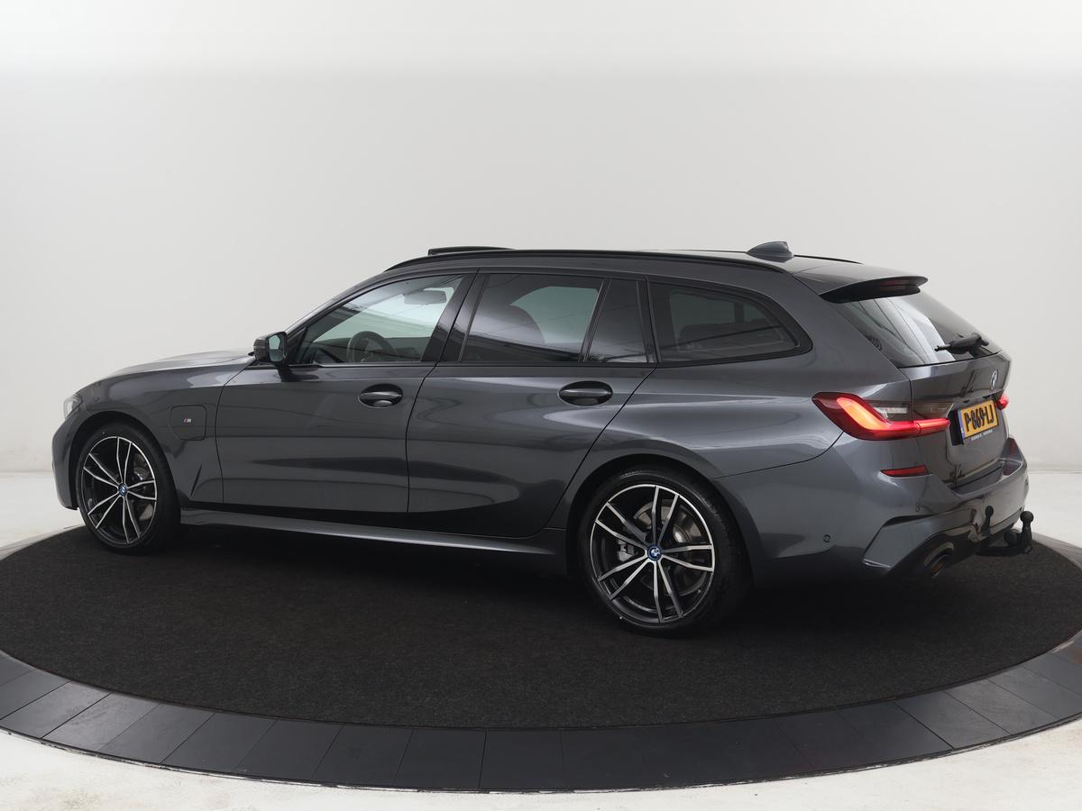 BMW 3 Serie BMW 3-serie Touring 320e Business Edition Plus M-sport | 84,4% SOH | Panoramadak | Leder | Elektrische trekhaak | Camera | Park assist | Cruise control | Carplay | Sfeerverlichting |