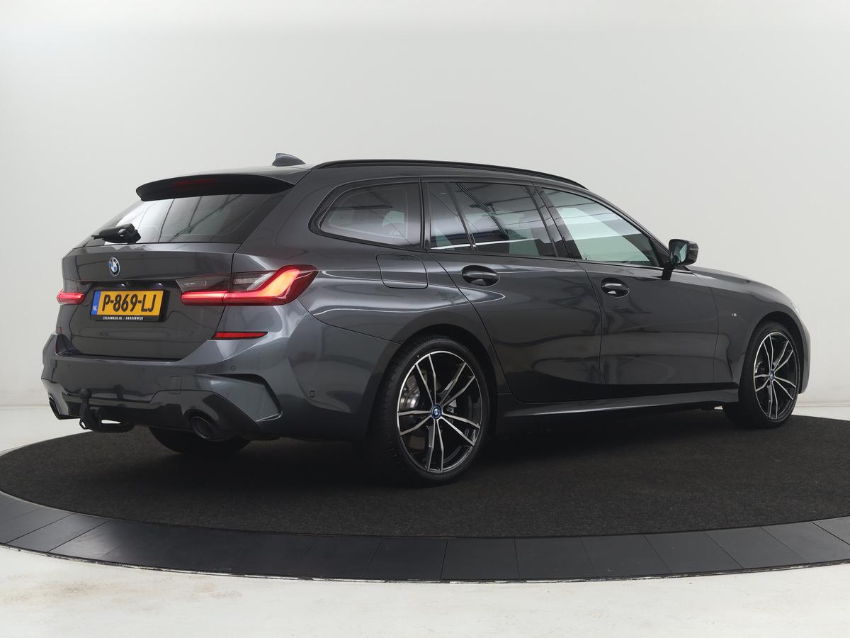 BMW 3 Serie BMW 3-serie Touring 320e Business Edition Plus M-sport | 84,4% SOH | Panoramadak | Leder | Elektrische trekhaak | Camera | Park assist | Cruise control | Carplay | Sfeerverlichting |