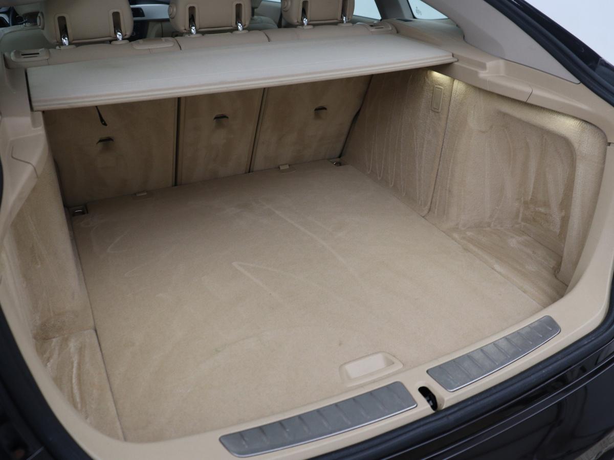 BMW 3 Serie BMW 3-serie Gran Turismo 320i High Executive | Leder | Cruise control | Stoelverwarming |  Climate control | Camera | Park assist | Navigatie | Bluetooth | Elektrische achterklep