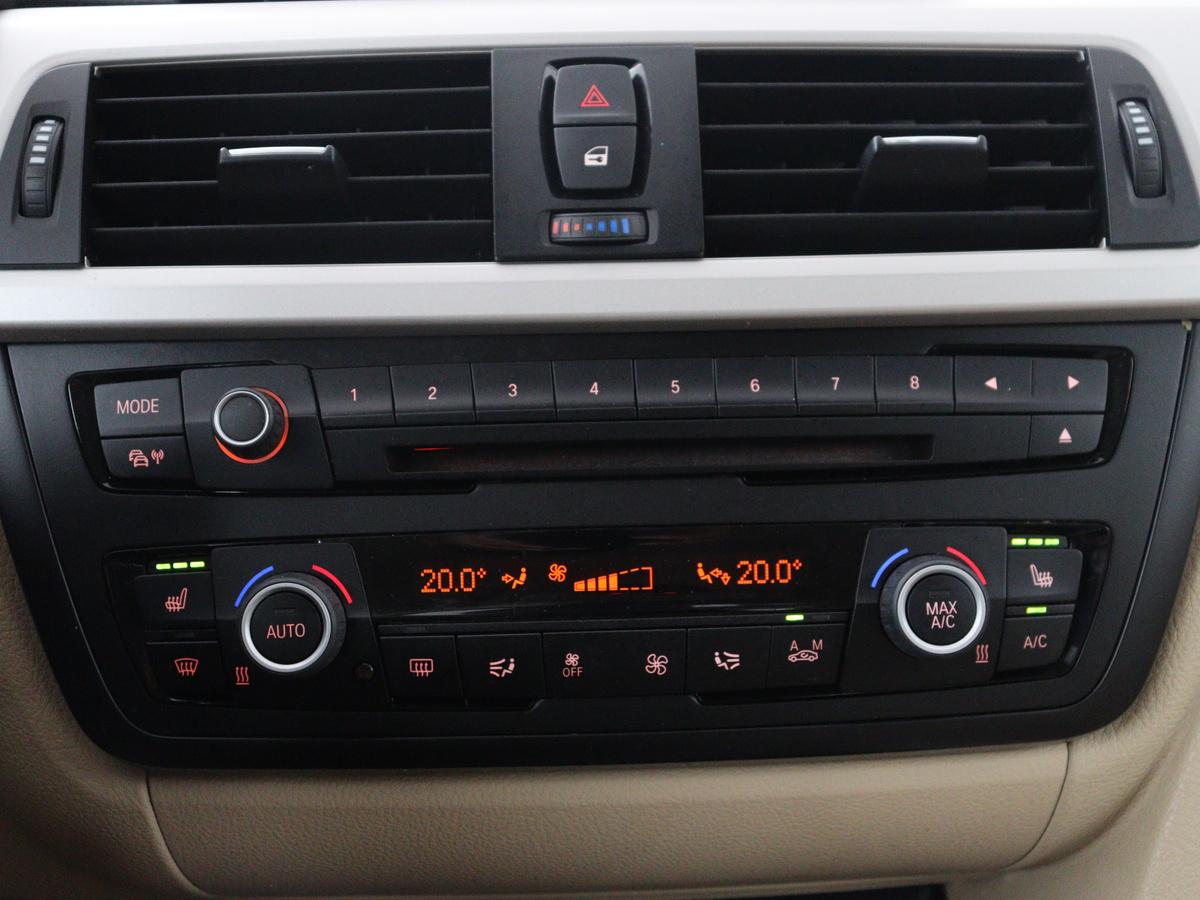 BMW 3 Serie BMW 3-serie Gran Turismo 320i High Executive | Leder | Cruise control | Stoelverwarming |  Climate control | Camera | Park assist | Navigatie | Bluetooth | Elektrische achterklep