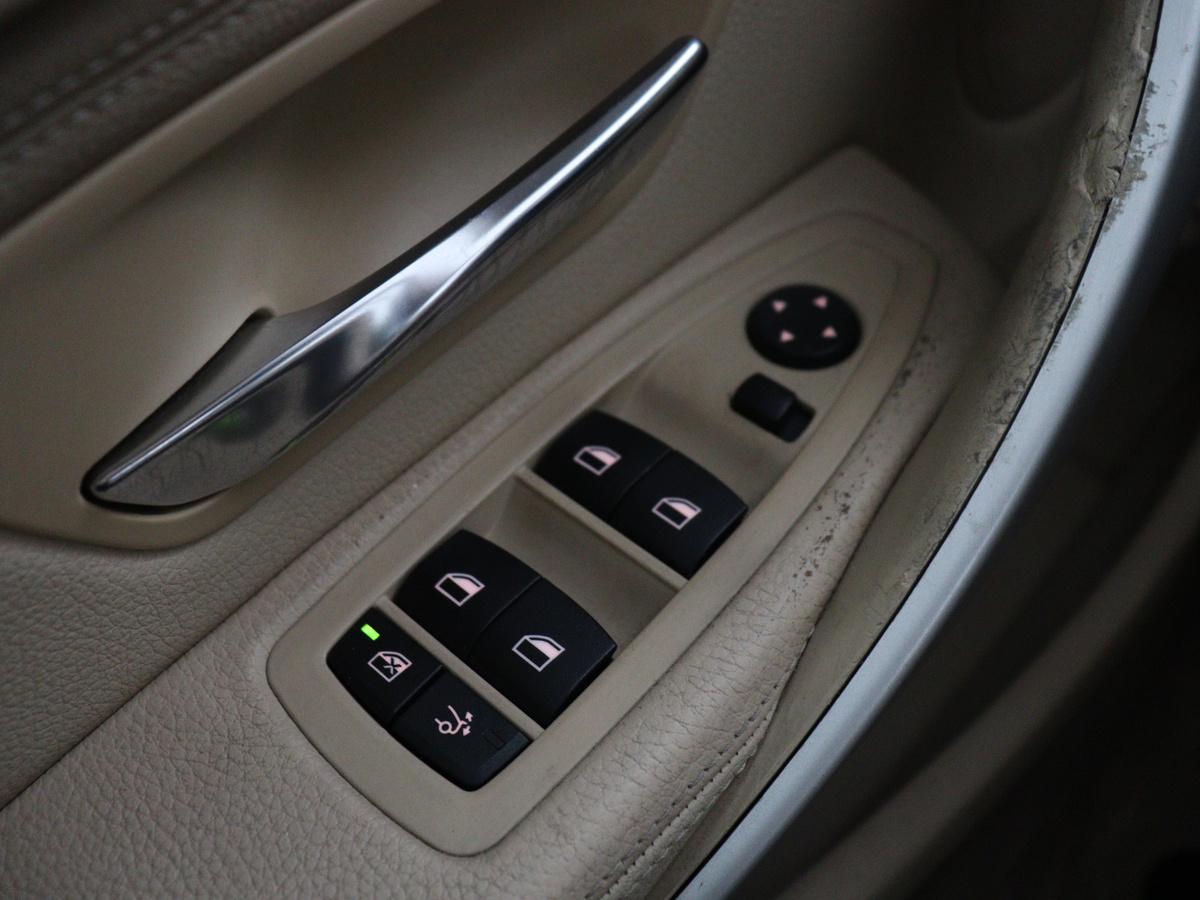 BMW 3 Serie BMW 3-serie Gran Turismo 320i High Executive | Leder | Cruise control | Stoelverwarming |  Climate control | Camera | Park assist | Navigatie | Bluetooth | Elektrische achterklep