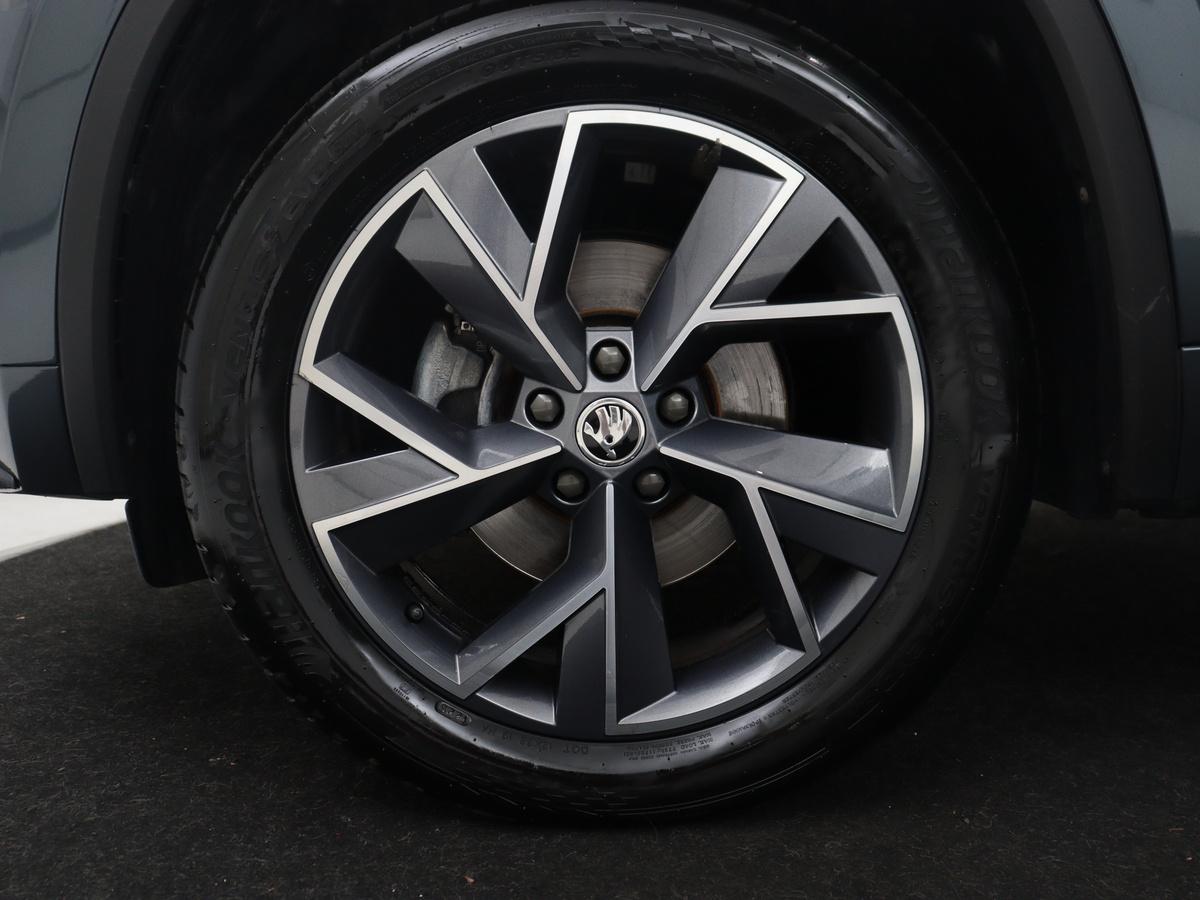 Škoda Kodiaq Skoda Kodiaq 1.5 TSI Sportline Business | Leder/alcantara | Memory | Cruise control | Stuur/stoel verwarming | Canton Sound | Carplay | Carplay | Camera | Park assist | Trekhaak | Elektrische achterklep