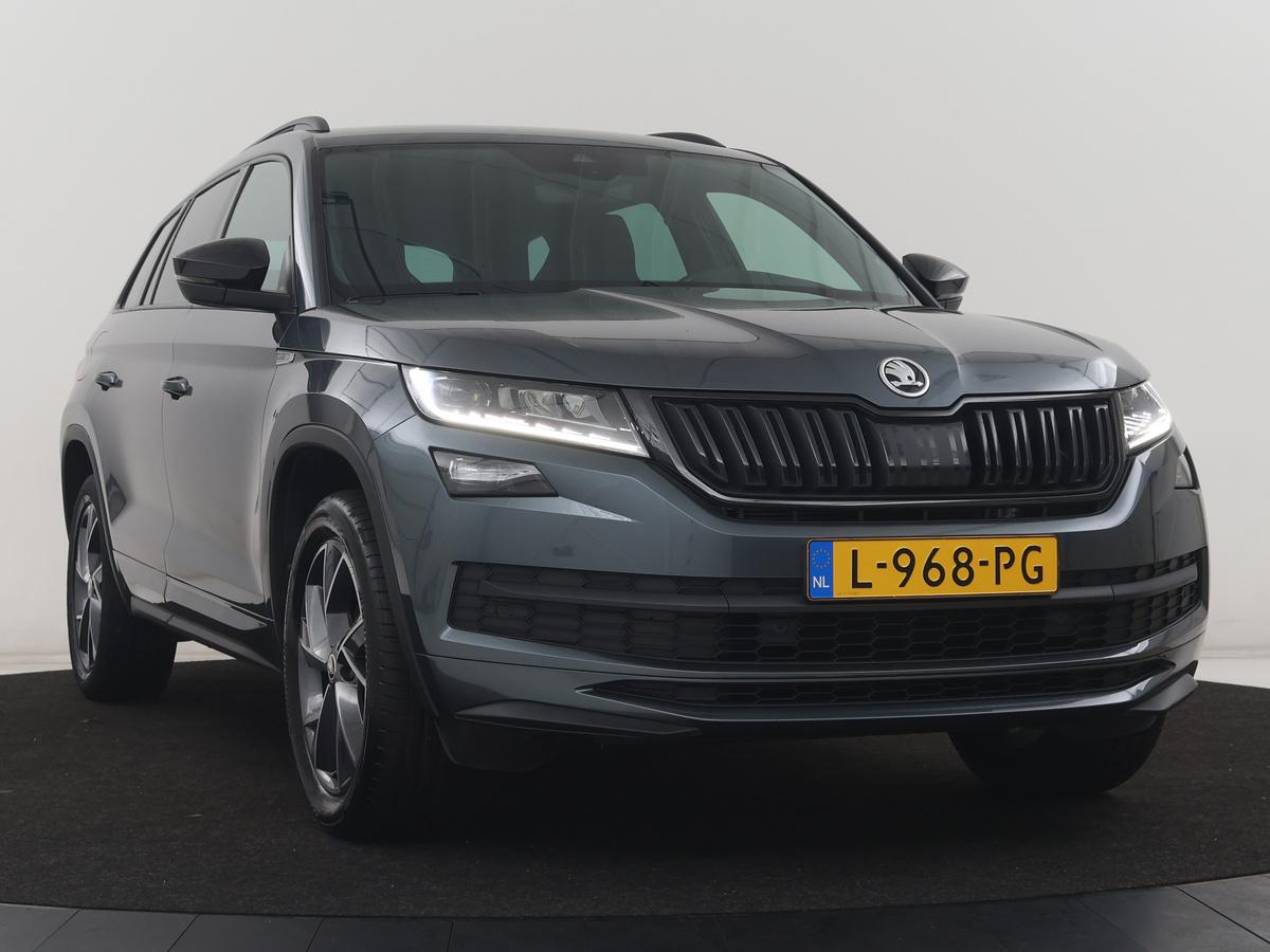 Škoda Kodiaq Skoda Kodiaq 1.5 TSI Sportline Business | Leder/alcantara | Memory | Cruise control | Stuur/stoel verwarming | Canton Sound | Carplay | Carplay | Camera | Park assist | Trekhaak | Elektrische achterklep