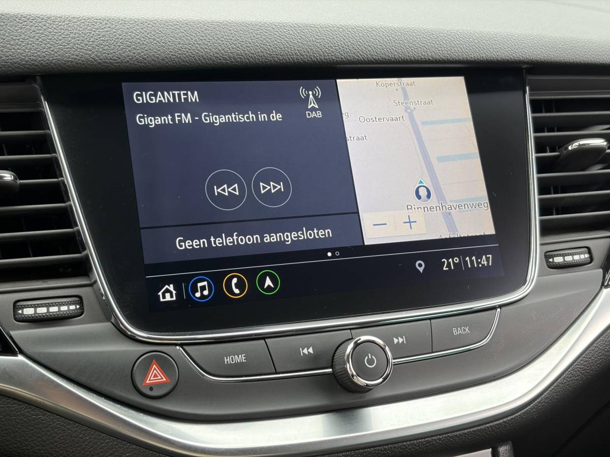 Opel Astra Opel Astra Sports Tourer 1.2 Elegance ✓131pk✓2e Eigenaar✓Camera✓Carplay✓6 Bak✓Stoelverw✓Stuurverw✓Pdc V+A✓Recent beurt gehad✓Clima✓Cruise✓Halfleder✓Keyless✓N.A.P✓Lm velgen✓Rijstrooksensor✓Apk tot 09-2028