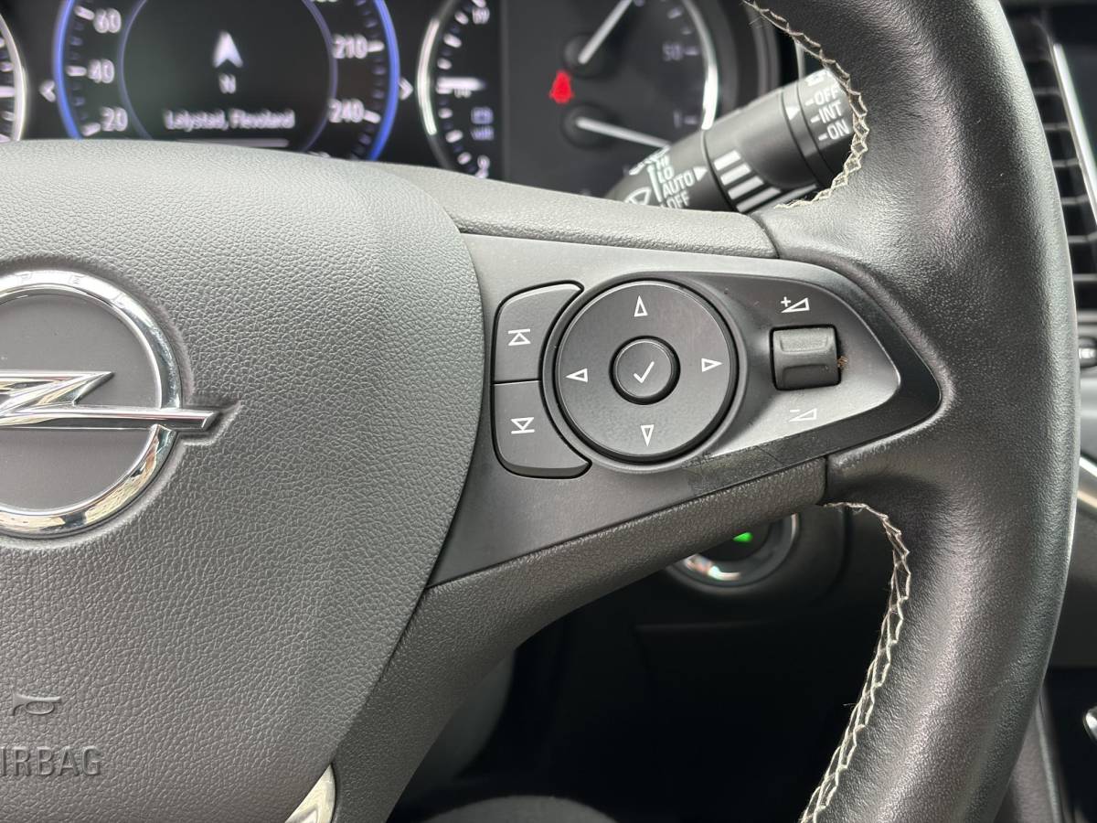Opel Astra Opel Astra Sports Tourer 1.2 Elegance ✓131pk✓2e Eigenaar✓Camera✓Carplay✓6 Bak✓Stoelverw✓Stuurverw✓Pdc V+A✓Recent beurt gehad✓Clima✓Cruise✓Halfleder✓Keyless✓N.A.P✓Lm velgen✓Rijstrooksensor✓Apk tot 09-2028