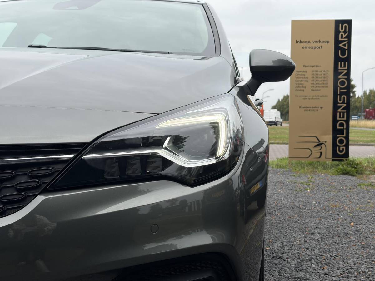 Opel Astra Opel Astra Sports Tourer 1.2 Elegance ✓131pk✓2e Eigenaar✓Camera✓Carplay✓6 Bak✓Stoelverw✓Stuurverw✓Pdc V+A✓Recent beurt gehad✓Clima✓Cruise✓Halfleder✓Keyless✓N.A.P✓Lm velgen✓Rijstrooksensor✓Apk tot 09-2028