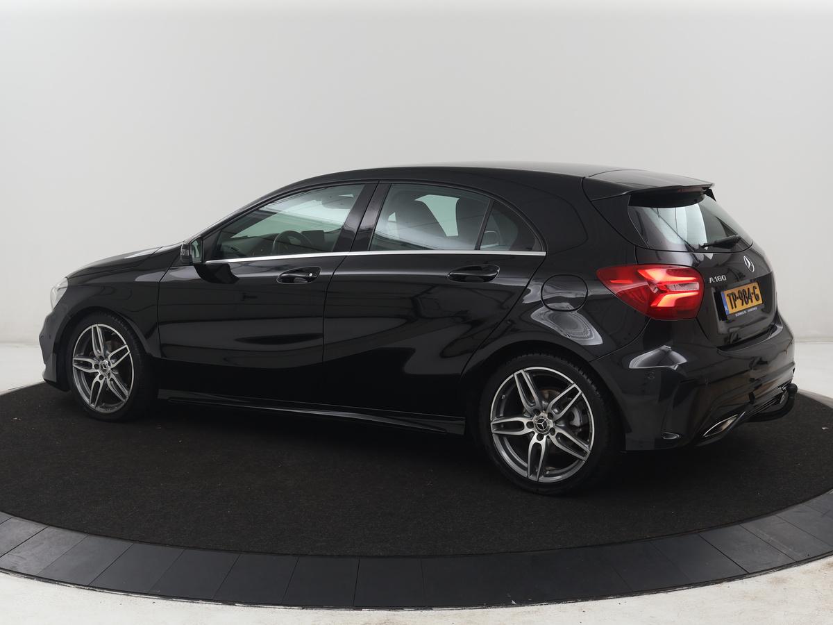 Mercedes-Benz A-Klasse Mercedes-Benz A-klasse 180 Business Solution AMG | Leder/alcantara | Stoelverwarming | Cruise control | Navigatie | Bluetooth | Camera | Park assist | Trekhaak