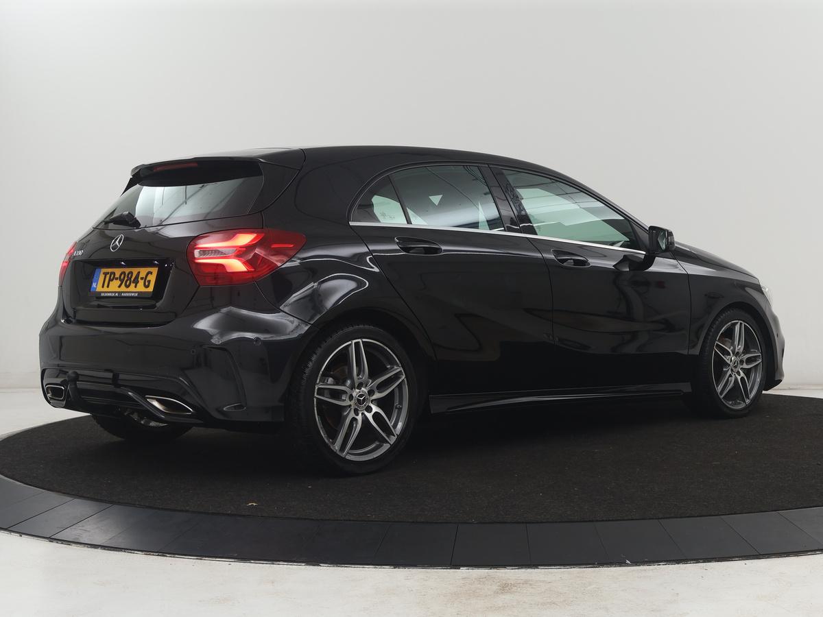 Mercedes-Benz A-Klasse Mercedes-Benz A-klasse 180 Business Solution AMG | Leder/alcantara | Stoelverwarming | Cruise control | Navigatie | Bluetooth | Camera | Park assist | Trekhaak
