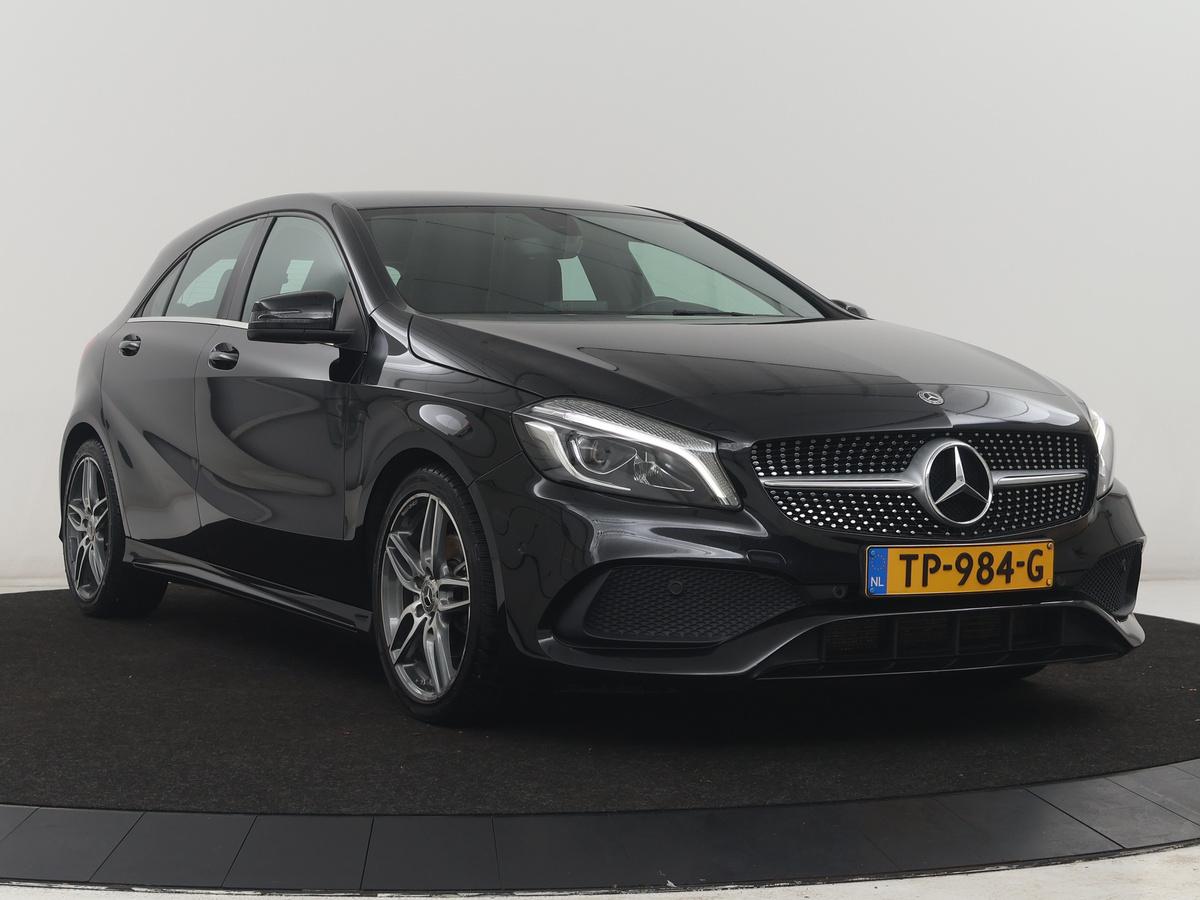 Mercedes-Benz A-Klasse Mercedes-Benz A-klasse 180 Business Solution AMG | Leder/alcantara | Stoelverwarming | Cruise control | Navigatie | Bluetooth | Camera | Park assist | Trekhaak