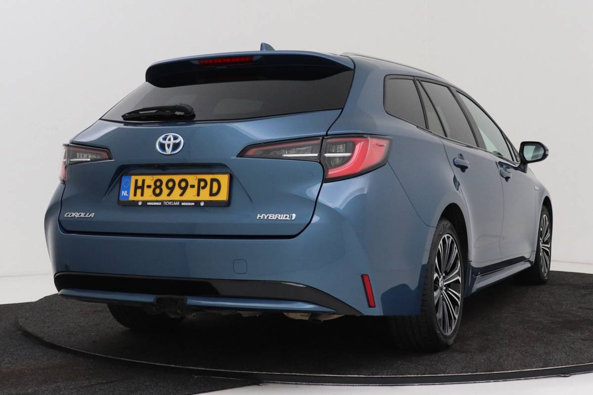 Toyota Corolla Touring Sports Toyota Corolla Touring Sports 1.8 Hybrid Business Plus | Org NL | Trekhaak | Camera | CarPlay | Stoelverwarming |