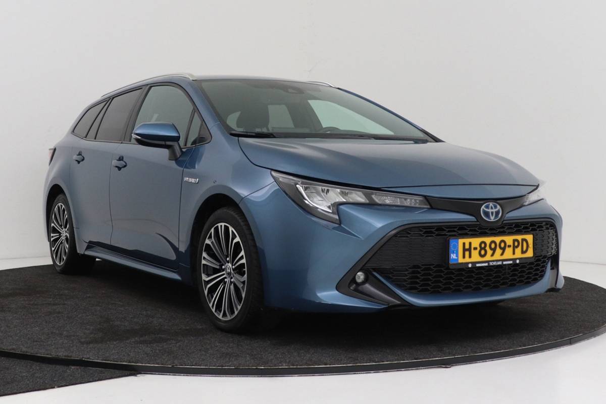 Toyota Corolla Touring Sports Toyota Corolla Touring Sports 1.8 Hybrid Business Plus | Org NL | Trekhaak | Camera | CarPlay | Stoelverwarming |