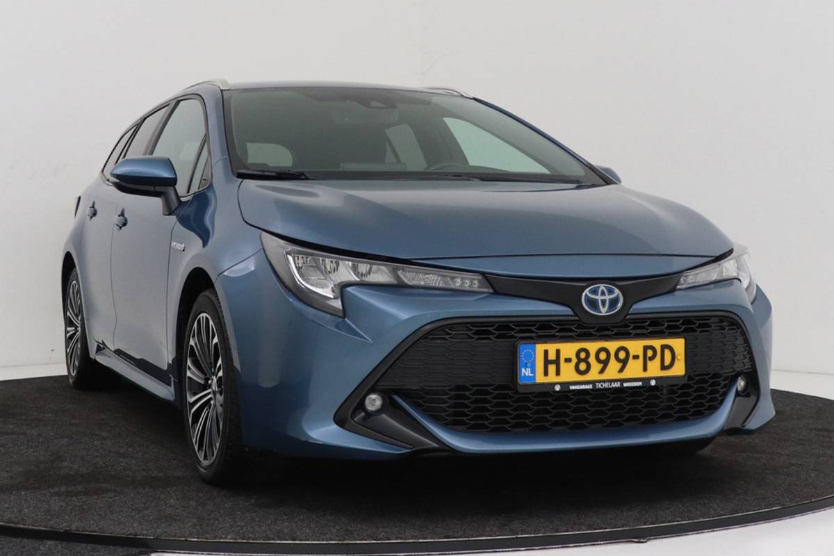 Toyota Corolla Touring Sports Toyota Corolla Touring Sports 1.8 Hybrid Business Plus | Org NL | Trekhaak | Camera | CarPlay | Stoelverwarming |