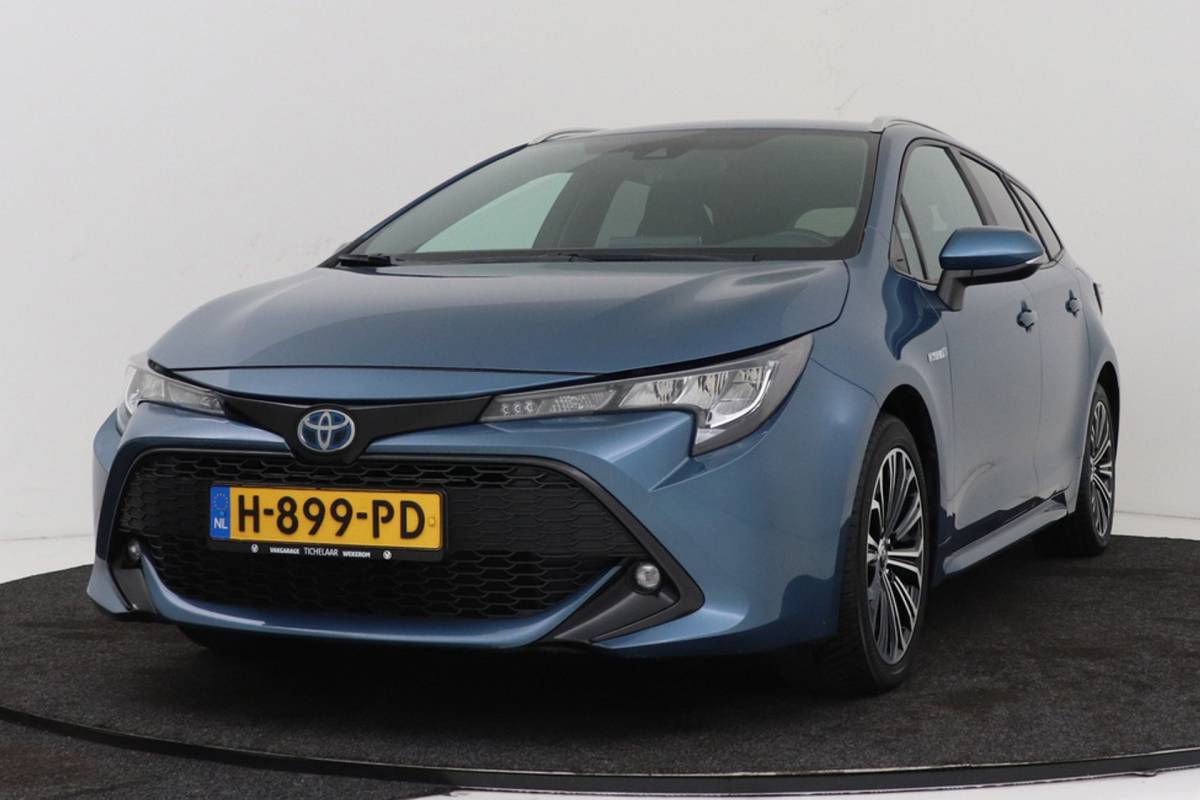 Toyota Corolla Touring Sports Toyota Corolla Touring Sports 1.8 Hybrid Business Plus | Org NL | Trekhaak | Camera | CarPlay | Stoelverwarming |