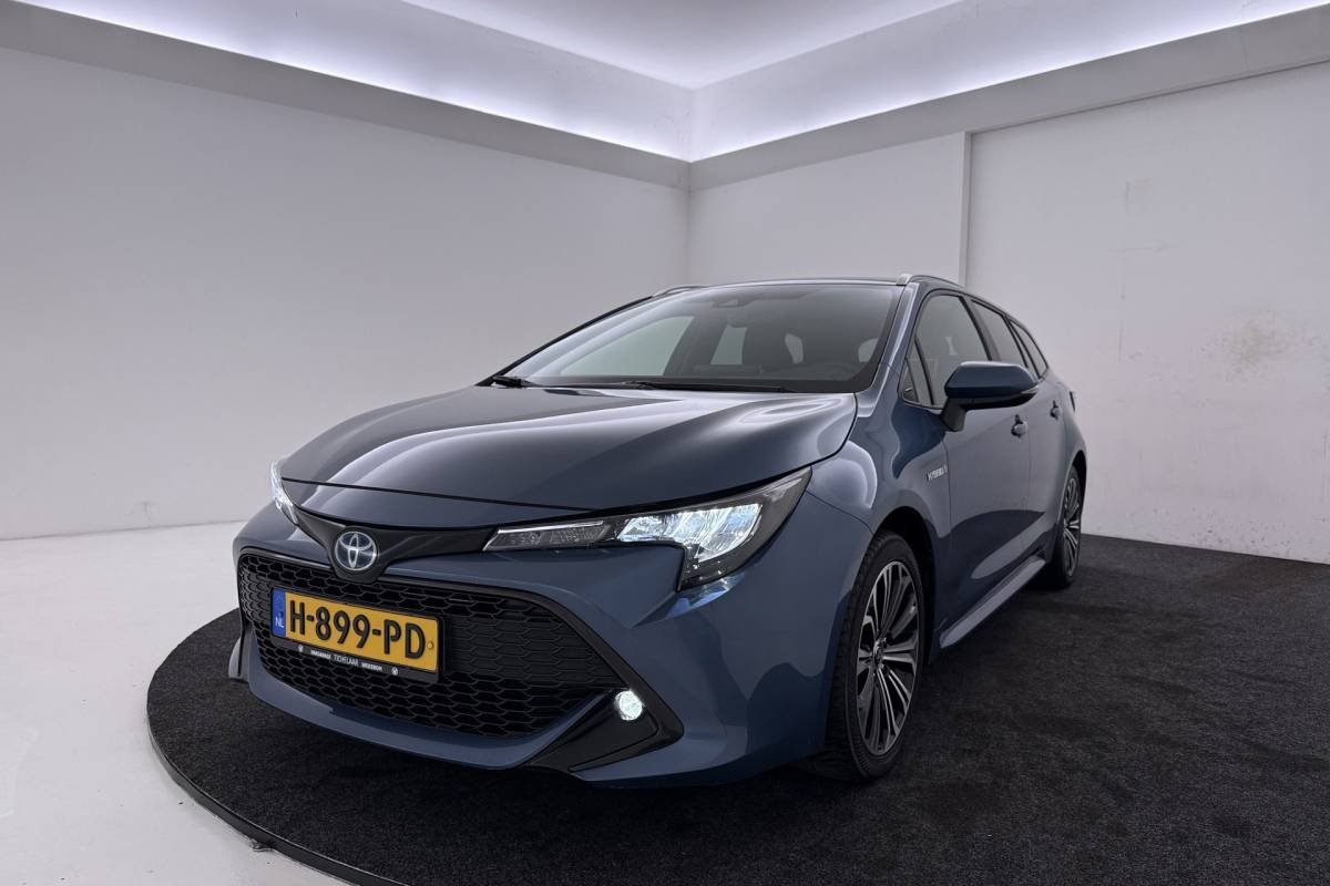 Toyota Corolla Touring Sports Toyota Corolla Touring Sports 1.8 Hybrid Business Plus | Org NL | Trekhaak | Camera | CarPlay | Stoelverwarming |